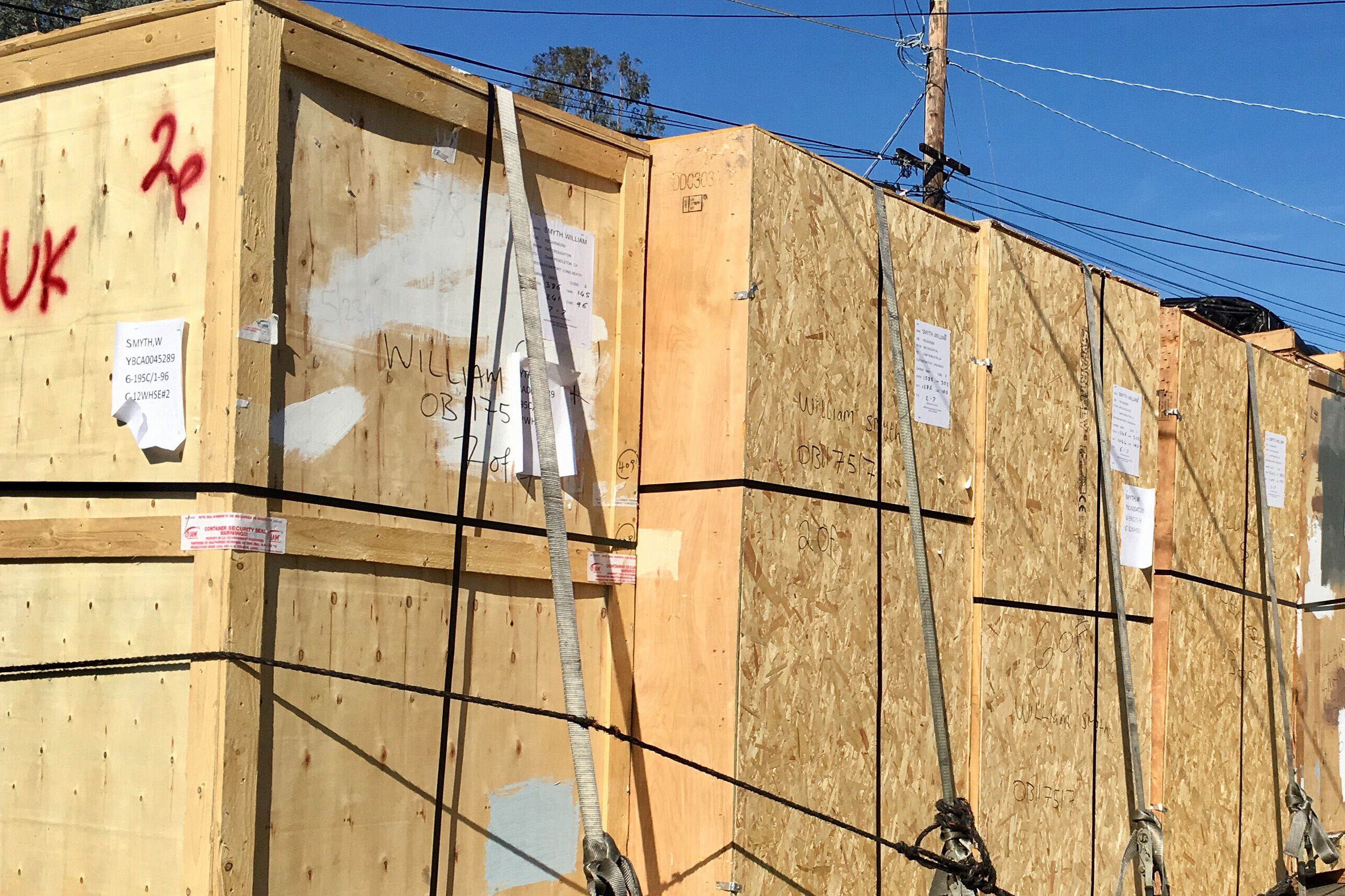 moving-truck-loaded-with-crates-from-overseas-move-2024-11-02-01-14-55-utc